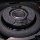 Корпус сабвуфера стелс для Geely Atlas Pro в запасное колесо